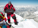Jamie Clarke of Calgary poses at the summit of Mount Everest in 2010.