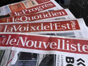 A selection of newspapers owned by Groupe Capitales Medias (GCM) are pictured in Montreal on August 19, 2019.