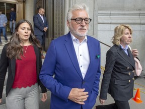 Gilbert Rozon founder of the Just for Laughs festival, leaves the Quebec Court of Appeals in Montreal on May 16, 2019. The Crown says Quebec entertainment mogul Gilbert Rozon has renounced his right to a preliminary hearing and has been ordered to stand trial in a sexual assault case. Rozon, a founder of Just for Laughs, was charged last December with rape and indecent assault, allegations stemming from a single female complainant and dating back nearly 40 years.