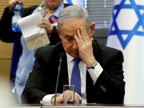 Israeli Prime Minister Benjamin Netanyahu is accused of receiving about 1 million shekels ($254,000) worth of cigars, champagne and jewelry from wealthy businessmen, including Hollywood producer Arnon Milchan, in exchange for tax breaks.