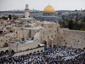 Thousands attend the annual prayer for the Passover holiday at the Western Wall in Jerusalem's old city.