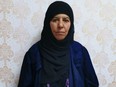 This handout undated picture taken and released by the press service of the Turkish Government, shows Rasmiya Awad, believed to be the sister of slain Islamic State leader Abu Bakr al-Baghdadi, who was captured in the northern Syrian town of Azaz by Turkish security officials, seen in an unknown location.