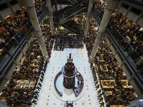 Employees of Lloyds of London and invited dignitaries commemorate Remembrance Day at the Lloyds Building in London, U.K., on Friday, Nov. 8, 2019.