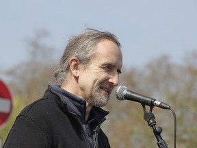 Roger Hallam speaks at an Extinction Rebellion event on April 15, 2019.