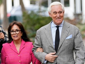 Roger Stone, former advisor to President Donald Trump, arrives with his wife Nydia for his trial at the E. Barrett Prettyman United States Courthouse on November 7, 2019 in Washington, DC. Stone has been charged with lying to Congress and witness tampering.