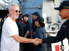 Midway director Roland Emmerich meets a sailor aboard the USS Halsey on October 20, 2019 in Honolulu, Hawaii.