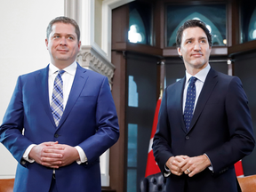Conservative Leader Andrew Scheer, left, meets with Prime Minister Justin Trudeau on Parliament Hill in Ottawa on Nov. 12, 2019.