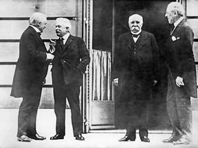 Left to right: British Prime Minister Lloyd George, Italian Council President Vittorio Orlando, French council President Georges Clemenceau and U.S. President Woodrow Wilson attending the opening day of the Conference for Peace in Paris on Jan. 19, 1919.