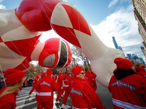 The Red Power Ranger balloon is carried low in high winds during the 93rd Macy's Thanksgiving Day Parade in New York, U.S., November 28, 2019.
