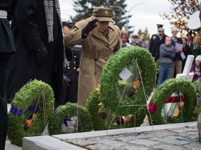 Annie Mary Gillies Hokonson, 96, who served with the Canadian Women's Army Corps in Canada, Holland and Germany during the Second World War, salutes after laying a wreath at the cenotaph during a Remembrance Day ceremony in New Westminster, B.C., on Monday November 11, 2019.