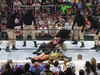 A group of men strangle and beat the Undertaker after Muhammad Hassan summoned them to the ring.