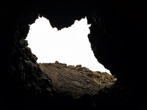 Light shining through a Lava Tube in Big Island, South Kohala, Hawaii