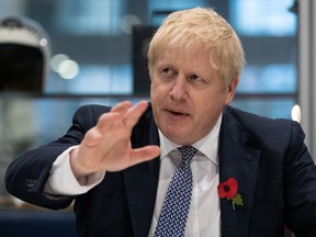 Britain's Prime Minister Boris Johnson visits Metropolitan Police training college in Hendon, London, Britain October 31, 2019. Aaron Chown/Pool via REUTERS