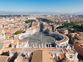 Saint Peter's Square in Vatican and panoranic view of the city from above, Rome, Italy.