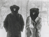 Georg Favre and Anna Hackman heavily clad in bear and fox fur, Finland, ca. 1910-20.