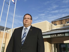 Mayor Gerald Aalbers poses for a photo outside of City Hall in Lloydminster, Alberta on Thursday, December 22, 2016.