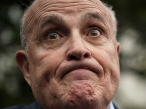 Rudy Giuliani, former New York City mayor and current lawyer for U.S. President Donald Trump, speaks to members of the media during a White House Sports and Fitness Day at the South Lawn of the White House May 30, 2018 in Washington, DC.