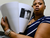 Devore Taylor finds a photo of her daughter Chrystul Kizer inside a police file on the sex crimes investigation into Randy Volar.