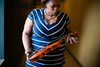 Chrystul Kizer’s mother, Devore Taylor, 36, holds the violin her daughter used to play. Chrystul attended a performing arts school in Indiana before moving to Milwaukee.