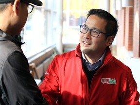 Ontario Liberal leadership candidate Alvin Tedjo speaks with a visitor to the Riverside Branch of the Windsor Public Library on Nov. 7, 2019.