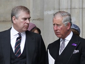 In this file photo taken on June 5, 2012, Britain's Prince Andrew, Duke of York (L), Prince Charles, Prince of Wales (C) are seen at St Paul's Cathedral after a national service of thanksgiving for the Queen's Diamond Jubilee in London.