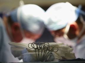 The Alberta government is planning to reduce wait times by increasing the use of private facilities for publicly funded surgeries.