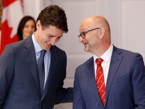 David Lametti speaks to Canada's Prime Minister Justin Trudeau after being presented as Minister of Justice and Attorney General of Canada during the presentation of Trudeau's new cabinet, at Rideau Hall in Ottawa, Ontario, Canada November 20, 2019.