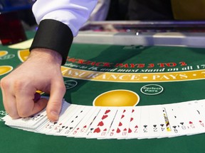 Dealers are busy getting ready to work as eight new table games are open at the Western Fair slots in London, Ont.. The tables are a precursor to the new casino opening up on Wonderland Road South Photograph taken on Thursday August 29, 2019.