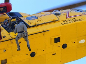 An American Para Jumper is lowered by a Canadian CH-149 Cormorant during a search and rescue exercise in Comox, B.C., in 2007.