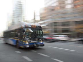 A bus is pictured in downtown Vancouver, Friday, November, 1, 2019. Vancouver transit operator Translink says a deal has been reached to avert a full strike by workers that had threatened to snarl the commute for Metro Vancouver residents who use the Expo or Millennium SkyTrain lines.THE CANADIAN PRESS/Jonathan Hayward