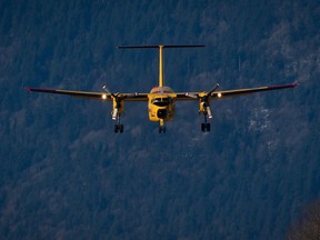 A Canadian Forces CC-115 Buffalo aircraft prepares to land at Chilliwack Airport in Chilliwack, B.C., on Friday February 28, 2014. The Canadian military has accepted the first of 16 new search-and-rescue planes despite outstanding issues with the aircraft's manuals.