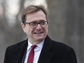 Jonathan Wilkinson arrives for the cabinet swearing-in ceremony in Ottawa on Wednesday, Nov. 20, 2019. Environment Minister Wilkinson says there will be no decision made about hiking the carbon price beyond $50 a tonne for at least another two years.