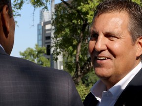 A new report says Manitoba should consider enhanced security cameras, a crackdown on panhandlers and other measures to improve safety in downtown Winnipeg. Spruce Woods Progressive Conservative candidate Cliff Cullen speaks during an announcement outside the Health Sciences Centre, in Winnipge on Thursday, Aug. 22, 2019.