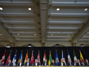 Canada's premiers, left to right, Sandy Silver, Yukon, Dwight Ball, Newfoundland and Labrador, Brian Pallister, Manitoba, Stephen McNeil, Nova Scotia, Doug Ford, Ontario, Scott Moe, Saskatchewan, Francois Legault, Quebec, Blaine Higgs, New Brunswick, John Horgan, British Columbia, Jason Kenney, Alberta and Joe Savikataaq, Nunavut attend a closing news conference following a meeting of Canada's premiers in Saskatoon, Sask., Thursday, July 11, 2019. Premiers of all the provinces and territories gather Monday in Toronto to try to shape a collective agenda for their relationship with the federal government, after an election that left the nation in a partisan patchwork.