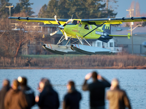 Greg McDougall, founder and CEO of Harbour Air Ltd., pilots a de Havilland DHC-2 Beaver prototype electric aircraft during a test flight at Vancouver International Airport in Richmond, B.C., Dec. 10, 2019.