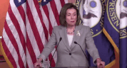 In the video, Pelosi appears to move her lips slightly before raising a glass of water to her mouth. 