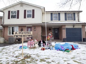 Justin Lutchin decorated his lawn with items including a Festivus pole in London, Ont. on Dec 13, 2018. Albertans met to air their grievances over a fair deal for Alberta, before Festivus.