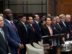 Gambia's Justice Minister Abubacarr Tambadou and Myanmar's leader Aung San Suu Kyi attend a hearing in a case filed by Gambia against Myanmar alleging genocide against the minority Muslim Rohingya population, at the International Court of Justice (ICJ) in The Hague, Netherlands December 10, 2019.