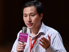 This file photo taken on November 28, 2018 shows Chinese scientist He Jiankui taking part in a question and answer session after speaking at the Second International Summit on Human Genome Editing in Hong Kong.