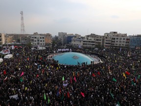 Iranian pro-government protesters attend a demonstration in Tehran, Iran November 25, 2019.