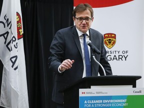 Federal Environment Minister Jonathan Wilkinson announces funding for climate action at the University of Calgary in Calgary, Alta., Tuesday, Dec. 17, 2019. The federal government says it is narrowing the gap between the greenhouse gas emissions reductions it is projecting and what it promised to achieve under the Paris Agreement.