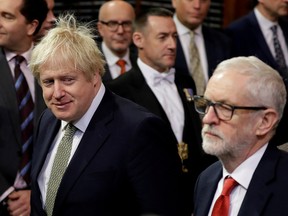 British Prime Minister Boris Johnson, left, and opposition Labour Party Leader Jeremy Corbyn attend the opening of Parliament in the House of Lords  in London, on Dec. 19, 2019.