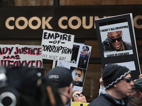 Protesters call for the removal of Cook County State's Attorney Kim Foxx on April 1, 2019, in Chicago, Ill., after Foxx's office dropped felony charges against Empire actor Jussie Smollett.