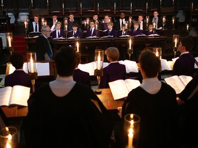 Choirmaster Stephen Cleobury leads a rehearsal of the King's College choir's Christmas Eve service in a file photo from Dec. 23, 2014, in London, England.