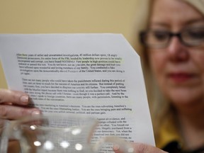 Representative Debbie Lesko, a Republican from Arizona, reads a copy of the letter U.S. President Donald Trump sent to House Speaker Nancy Pelosi during a House Rules Committee markup meeting on Capitol Hill in Washington, D.C., U.S., on Tuesday, Dec. 17, 2019. The House is preparing for an expected vote Wednesday on two articles of impeachment against Trump.