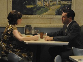 Elisabeth Moss and Jon Hamm as Peggy and Don in Mad Men's "The Suitcase."