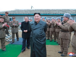 North Korean leader Kim Jong Un oversees a super-large multiple launch rocket system test in this undated picture released by North Korea's Central News Agency (KCNA) on November 28, 2019.