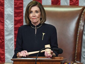 Speaker of the House Nancy Pelosi presides over Resolution 755, Articles of Impeachment Against President Donald J. Trump, as the House votes at the US Capitol in Washington, DC, on December 18, 2019.