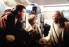 Ewan McGregor, left, Jake Lloyd and Liam Neeson confer in the movie Star Wars: Episode I The Phantom Menace.