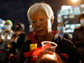 A protester attends a rally to mark International Human Rights Day in Hong Kong on Dec. 10, 2019.
